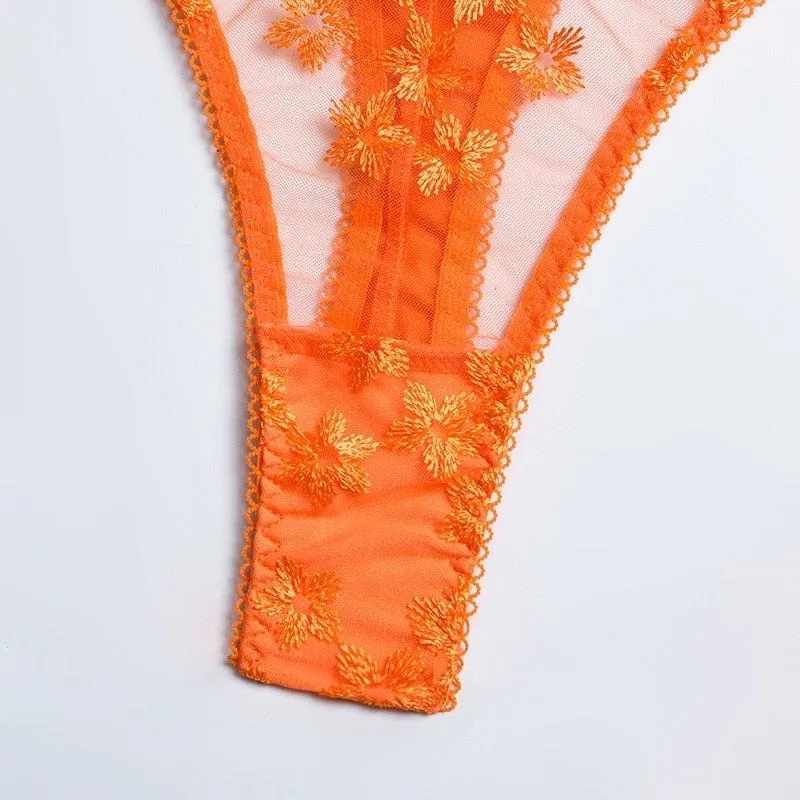 Conjunto de lencería naranja de encaje