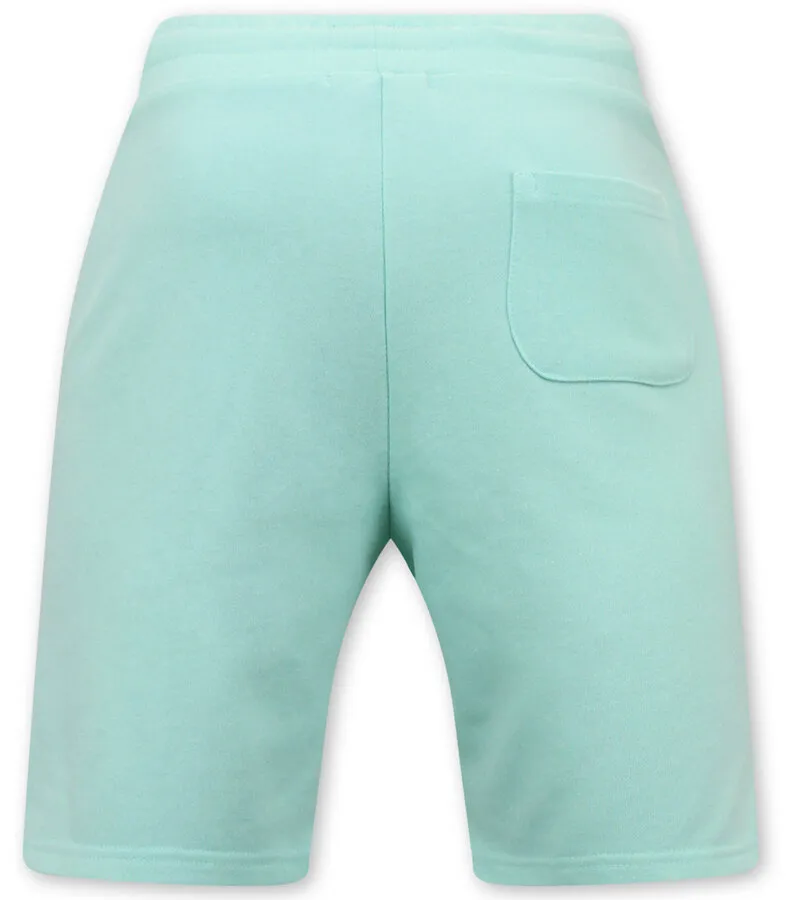 Pantalón corto hombre jogging tejido - verde claro