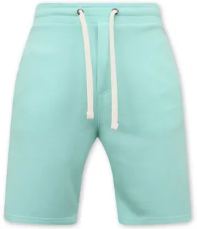 Pantalón corto hombre jogging tejido - verde claro