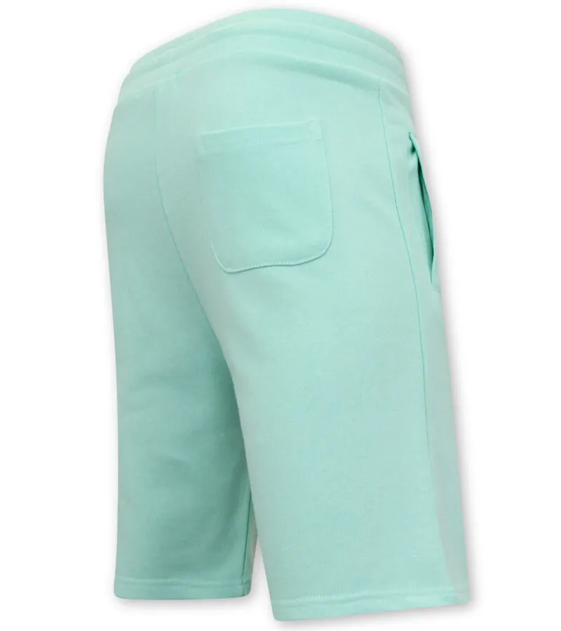 Pantalón corto hombre jogging tejido - verde claro