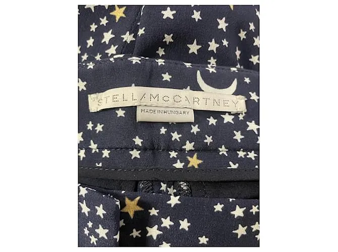 Stella Mc Cartney Stella McCartney Pantalón con estampado de lunas y estrellas de viscosa azul marino 